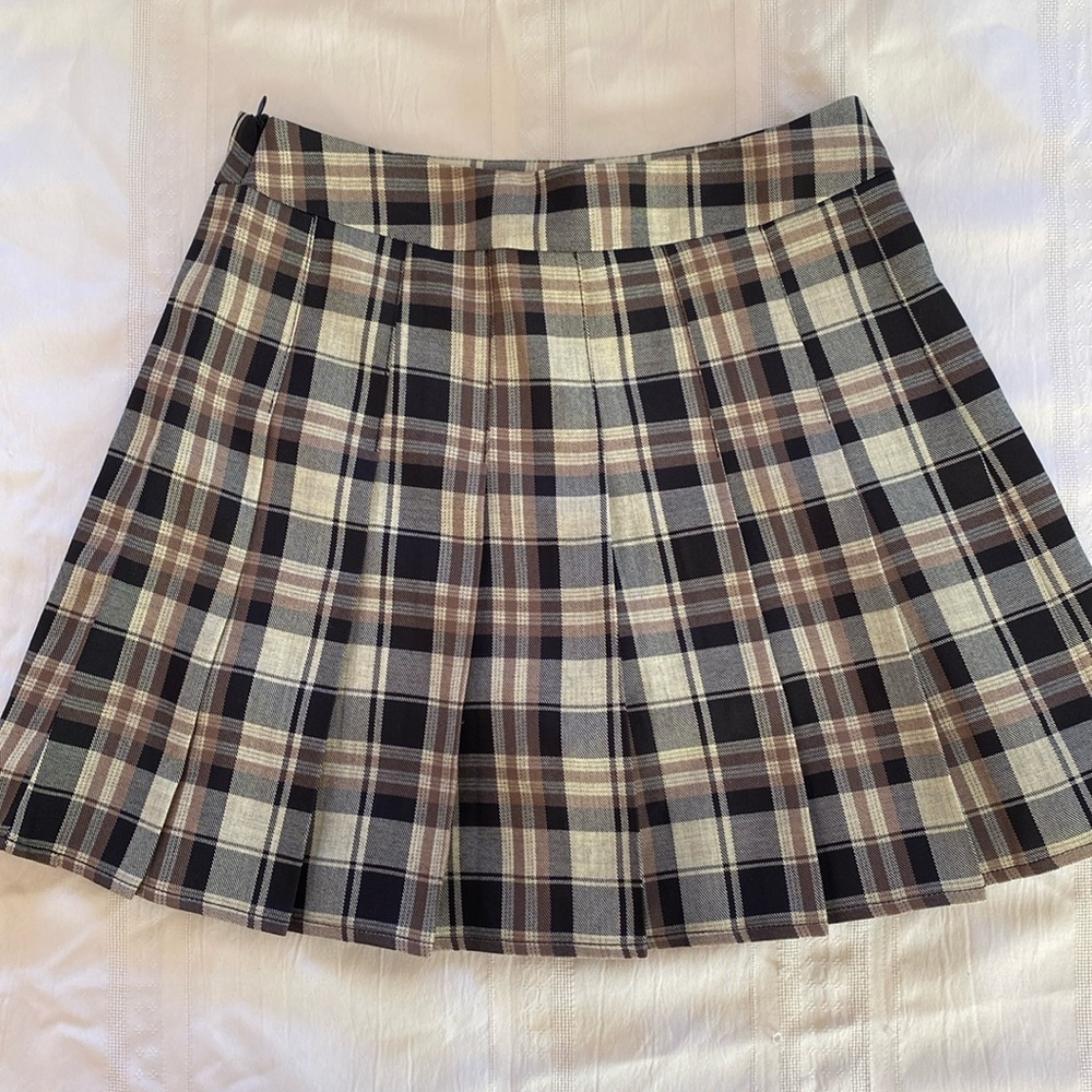 Pleated schoolgirl skirt with attached shorts